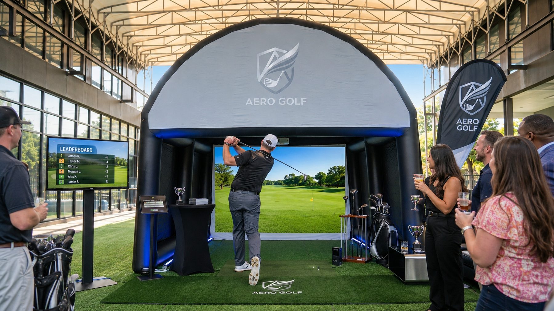 Guests playing the Aero Golf simulator with a live leaderboard at a corporate event
