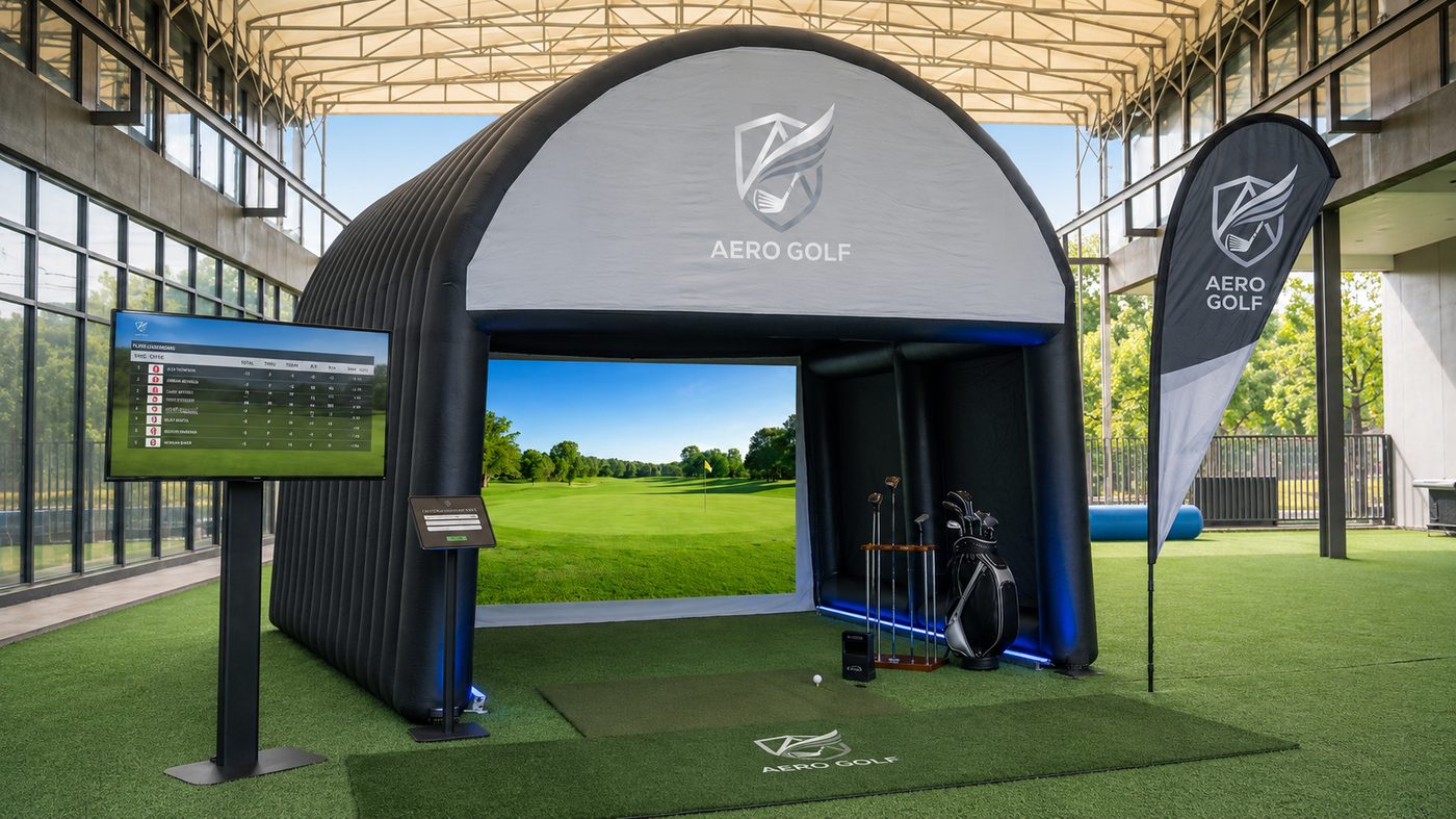 The Aero Golf branded enclosure set up with scoreboard and check-in stand